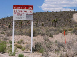 Area 51 no trespassing sign in the desert